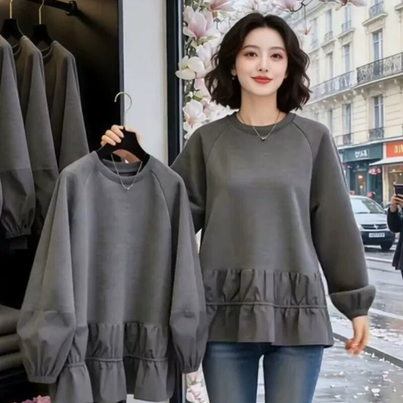 Korean-style loose-fitting round-neck sweatshirt for women, featuring patchwork and ruffled long sleeves, a loose and flattering fit, and a unique and beautiful design that looks great in autumn