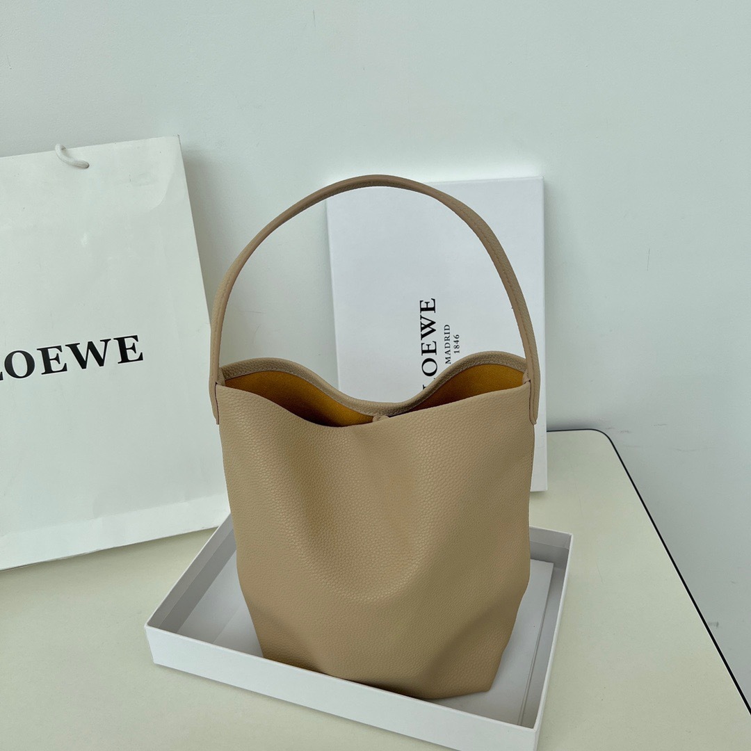 牛革トートバッグ女性のための 2025 新しいシングルショルダー大容量ショッピングバッグカジュアル怠惰なスタイル脇の下バッグ通勤バッグ