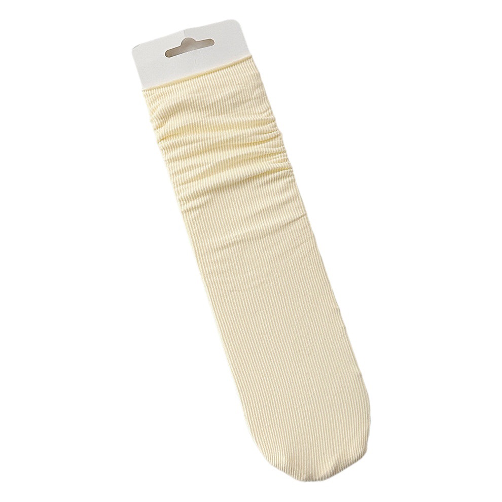 Calcetines de hielo calcetines de terciopelo de primavera y verano para mujer medias de media pantorrilla calcetines de JK largos blancos puros calcetines de moda al por mayor