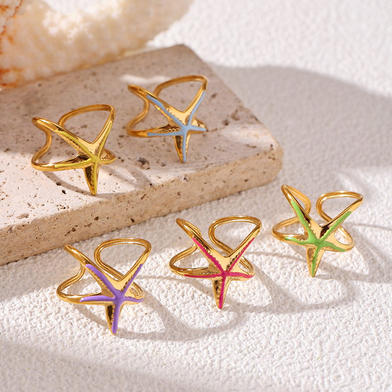 Tina Europa y los Estados Unidos transfronterizos lujo ligero anillo de estrella de mar nicho de diseño de goteo de aceite serie de joyas de mano para mujeres al por mayor