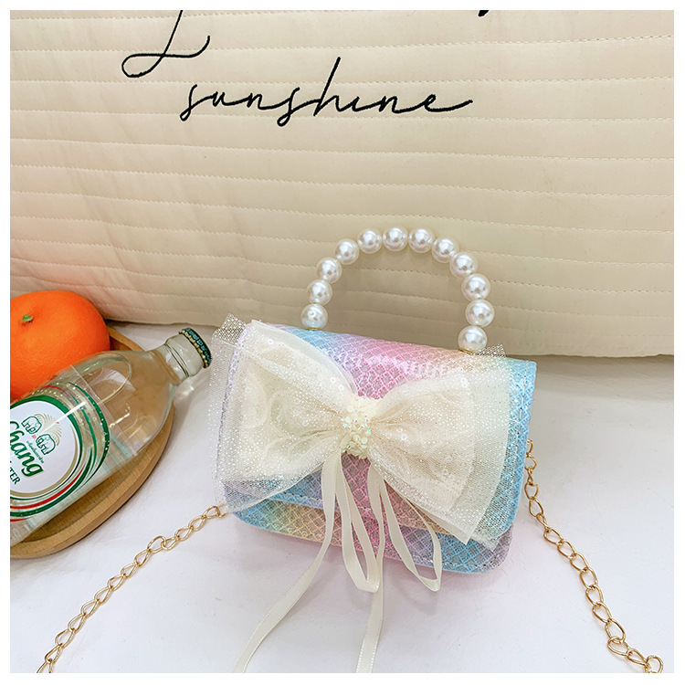 Bolsos de princesa transfronterizos nuevos bolsos de invierno y otoño de encaje de arco de tejido bolsos de mano de chicas cadenas bolsos de mochila accesorios