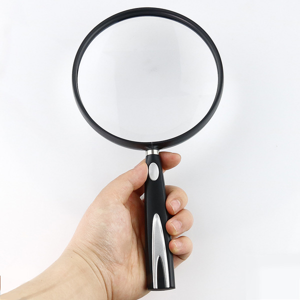 handheld magnifying glass