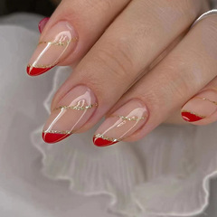 Almond-shaped, round-tip nail art with glitter, wave-patterned design, featuring a vibrant red color and a stylish French-style angled triangular motif—perfect for festive or bridal looks, available as wearable nail tips.