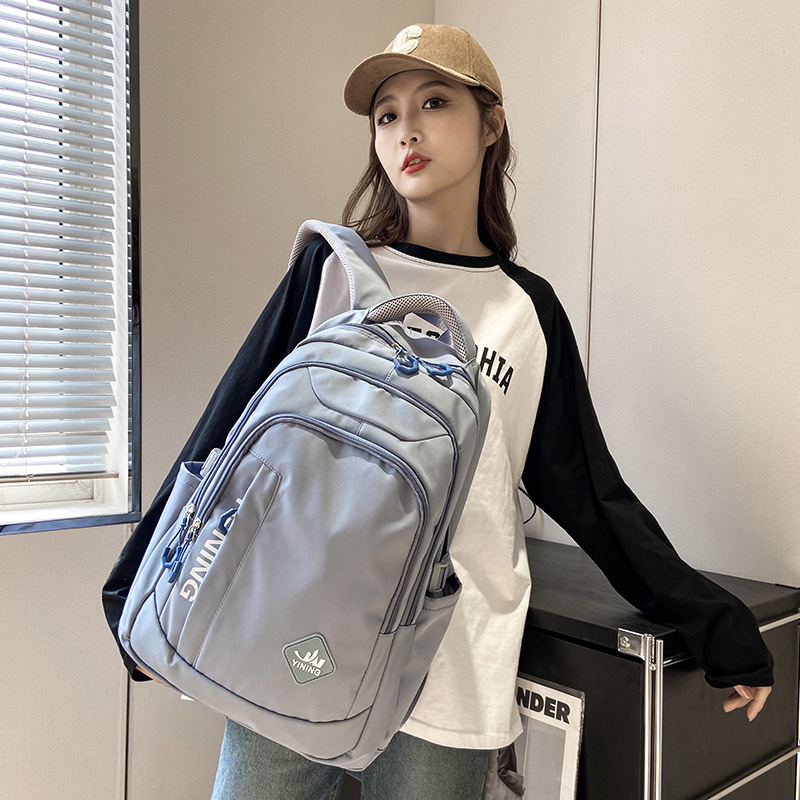 2023 nueva mochila espesa mochila de estudiantes color sólido simple mochila de hombro mochila de viaje resistente al desgaste bolsas de mujer y hombre