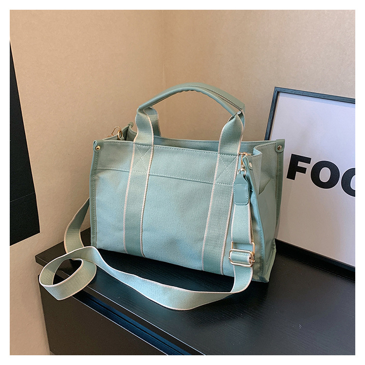 Bolso de lona de gran capacidad para mujer 2024 nuevo estilo coreano simple bolso de mensajero de un solo hombro bolso de viaje casual