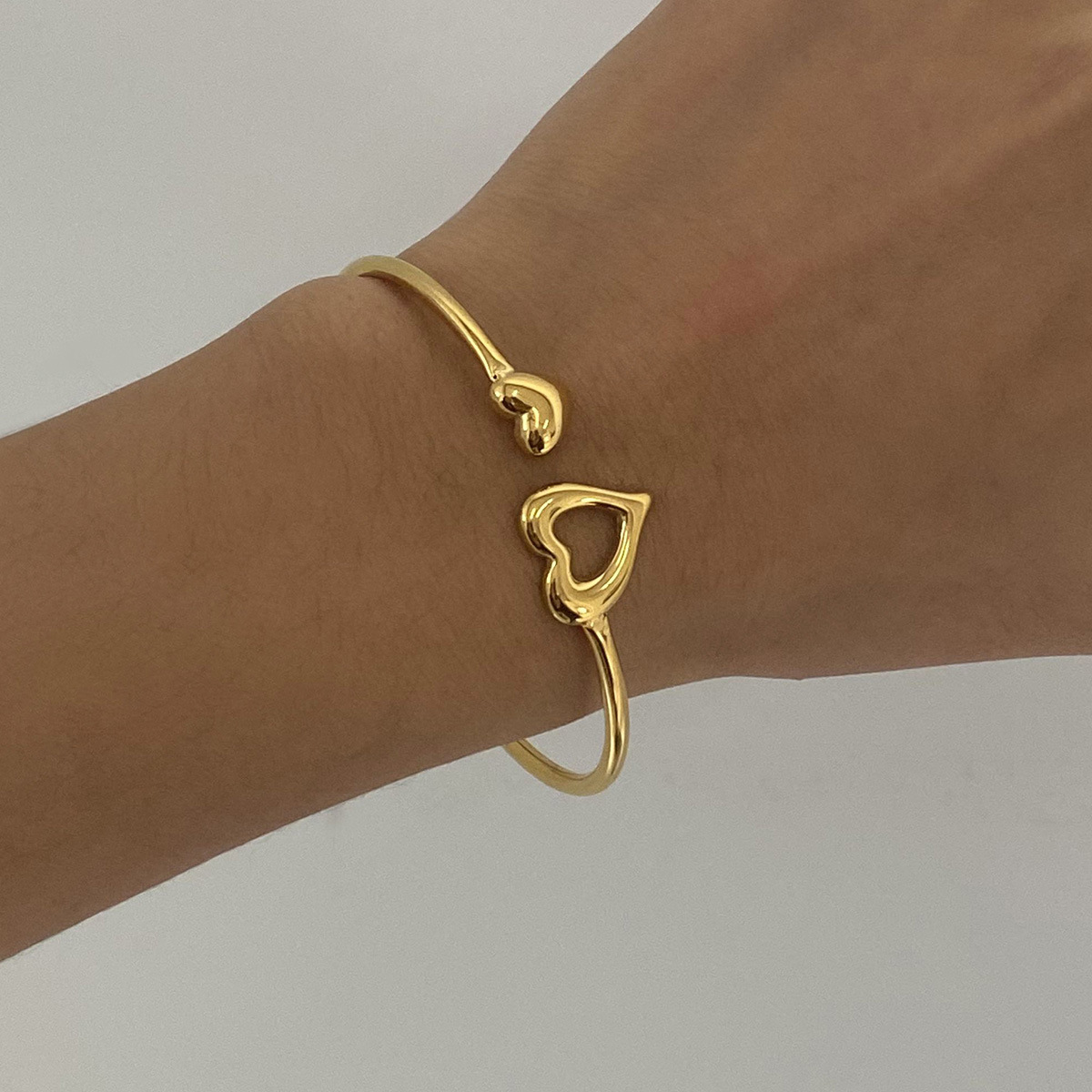 Jieding europeo y americano de acero inoxidable amor pulsera abierta anillo de mano de nicho de sentido de alta calidad pulsera de acero de titanio joyería transfronteriza