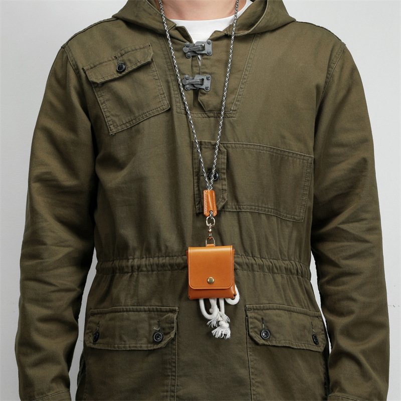 男女のミニ小銭入れは、トップの牛革をなめして、硬貨を掛けて、本革のイヤホンの保護カバーをしています。