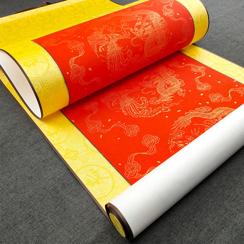 Fully silk-mounted blank painting scroll in Eternal Red with gold-sprinkled Xuan paper; dragon-and-phoenix tile-end couplet hanging scroll for central hall display; vertical scroll