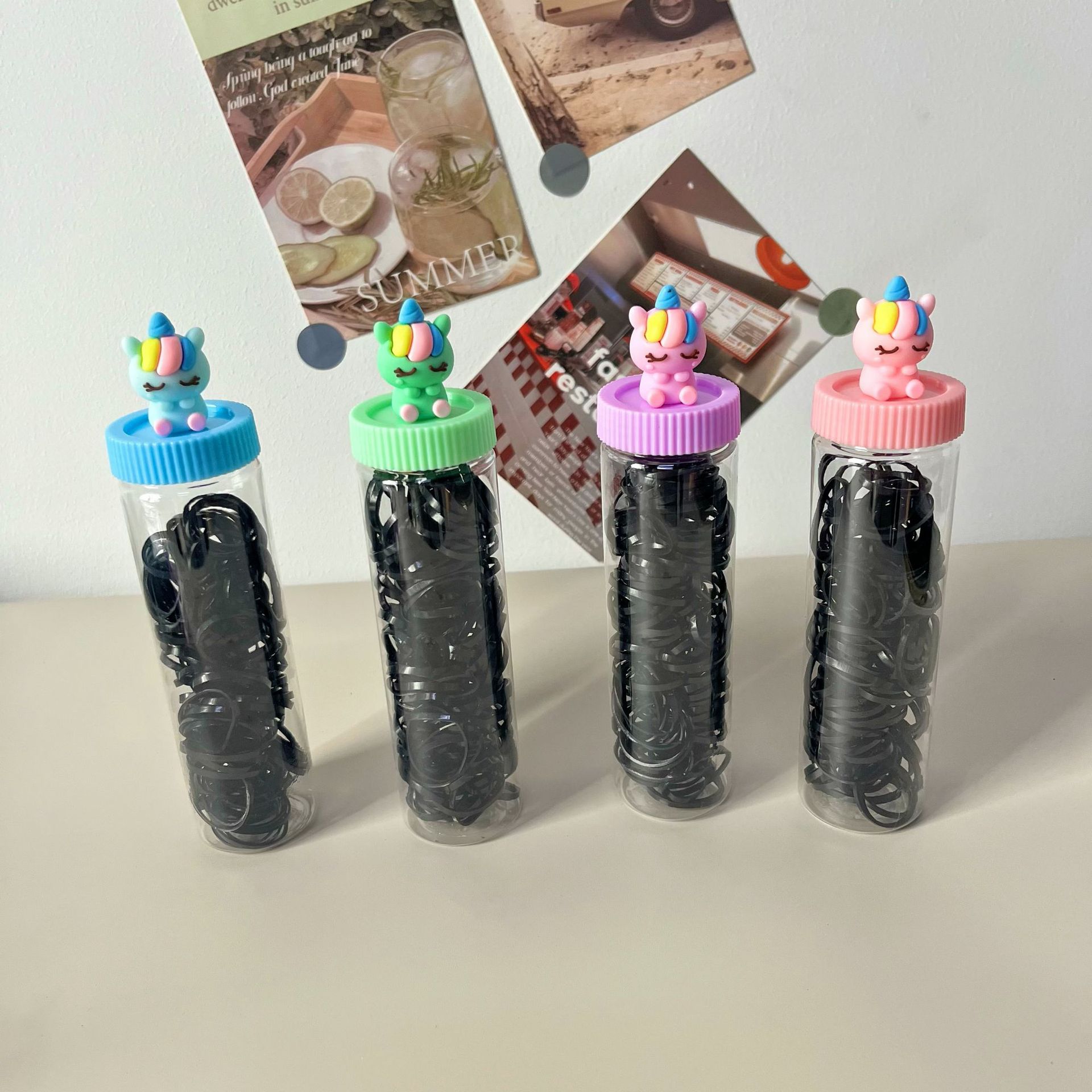 Yiwu al por mayor dibujos animados enlatados cabeza de cuerda de goma desechable negro colorido para niños no lastimar anillo de pelo cinta de goma encantadora