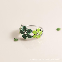 緑色のゴムの花の指輪の女性の気質のネットの赤い高級感は美しい五弁の花の指環のメーカーの卸売りを売ります。
