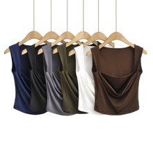 �ļ��¿�ŷ��Ůװʱ�д�ɫ�����Ը�С��������C74123