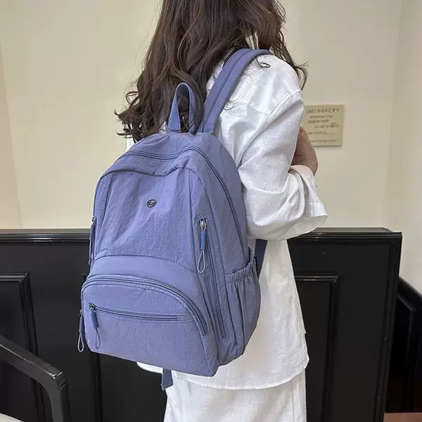 Large-capacity, lightweight, casual backpack – a new style that is versatile, simple, and fashionable, perfect for travel and suitable for college students and office workers