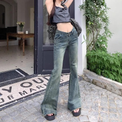アメリカ式ローウエストレトロなマイクロラッパジーパンの女性デザイン感は毛の縁をつなぎ合わせて痩せています。