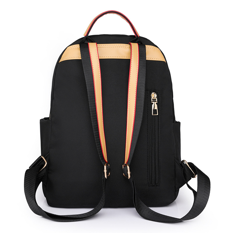 2023 nueva mochila de nailon para mujer de color de contraste moda simple de gran capacidad mochila de viaje al aire libre mochila escolar al por mayor