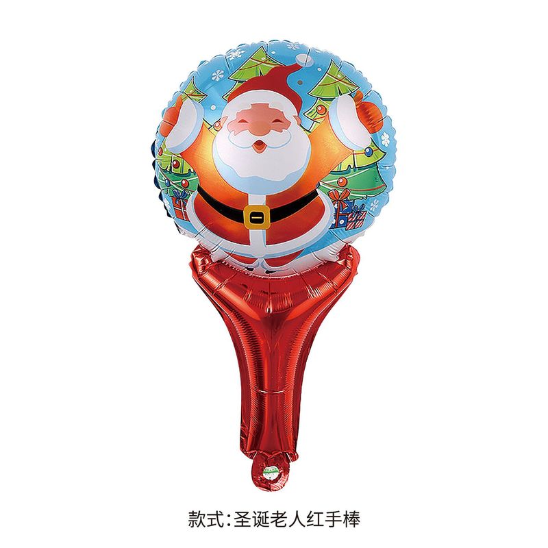 クリスマスのクリスマスツリーの老人雪だるまは棒のカチューシャの装飾品を持っています。|undefined