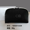 Black shell embroidery (with box)