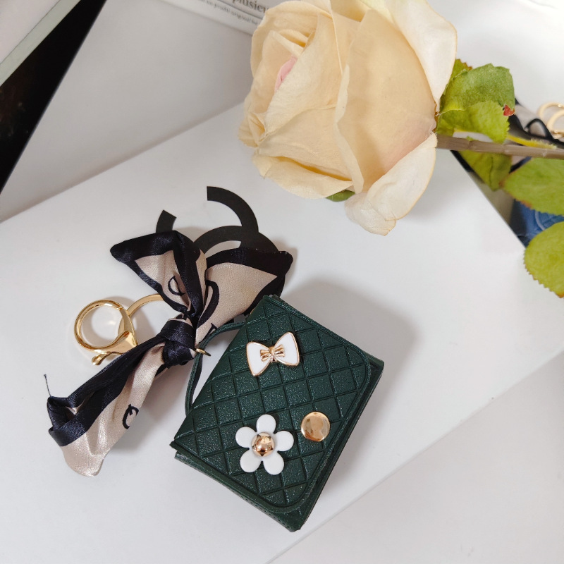 Nuevo estilo transfronterizo, moderno y exclusivo mini bolso acolchado tipo colgante, monedero para llaves, accesorio para auriculares.