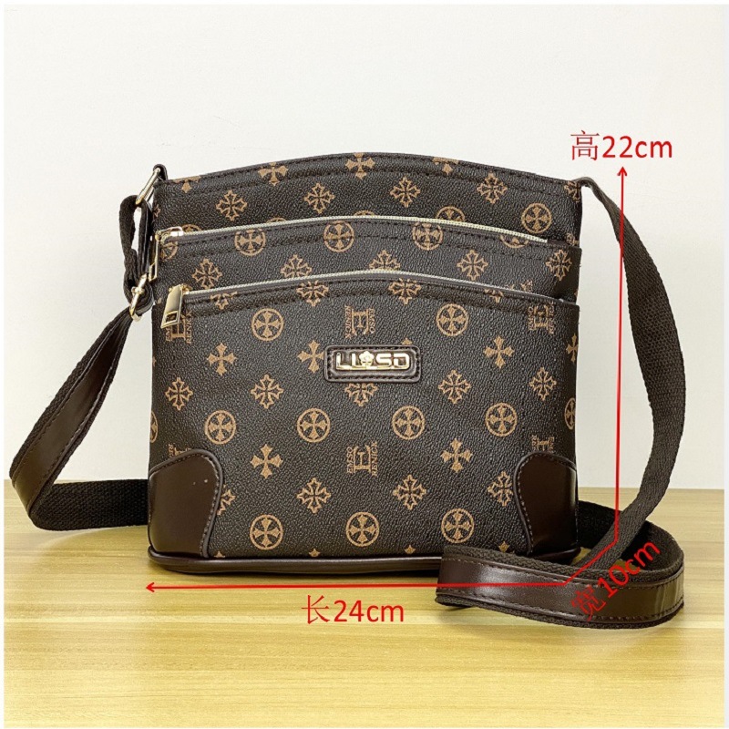 Guangzhou Hengli equipaje para mujer 2025 nuevo estilo coreano bolso de mensajero de un solo hombro bolso de cubo madre de mediana edad bolso de varias capas mujer