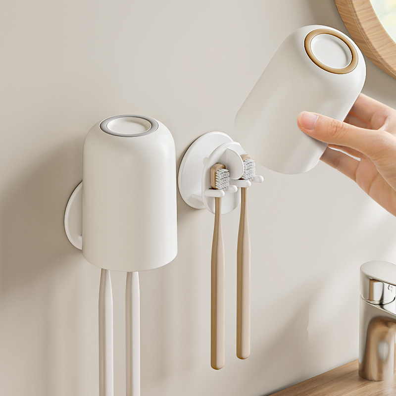 Estante de cepillo de dientes al por mayor Taza de enjuague bucal de baño sin perforación Estante de cepillo de dientes eléctrico de pared Estante de almacenamiento de dientes