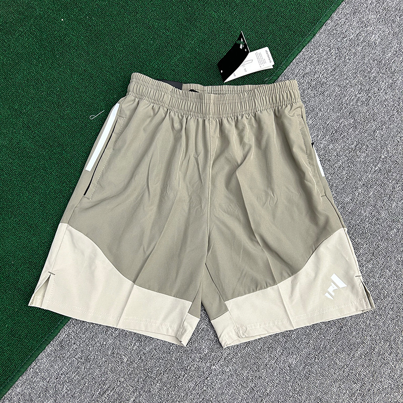 Fabricantes al por mayor de pantalones cortos deportivos para hombres de velocidad de hielo seco maratón de verano delgado entrenamiento de acondicionamiento físico panty