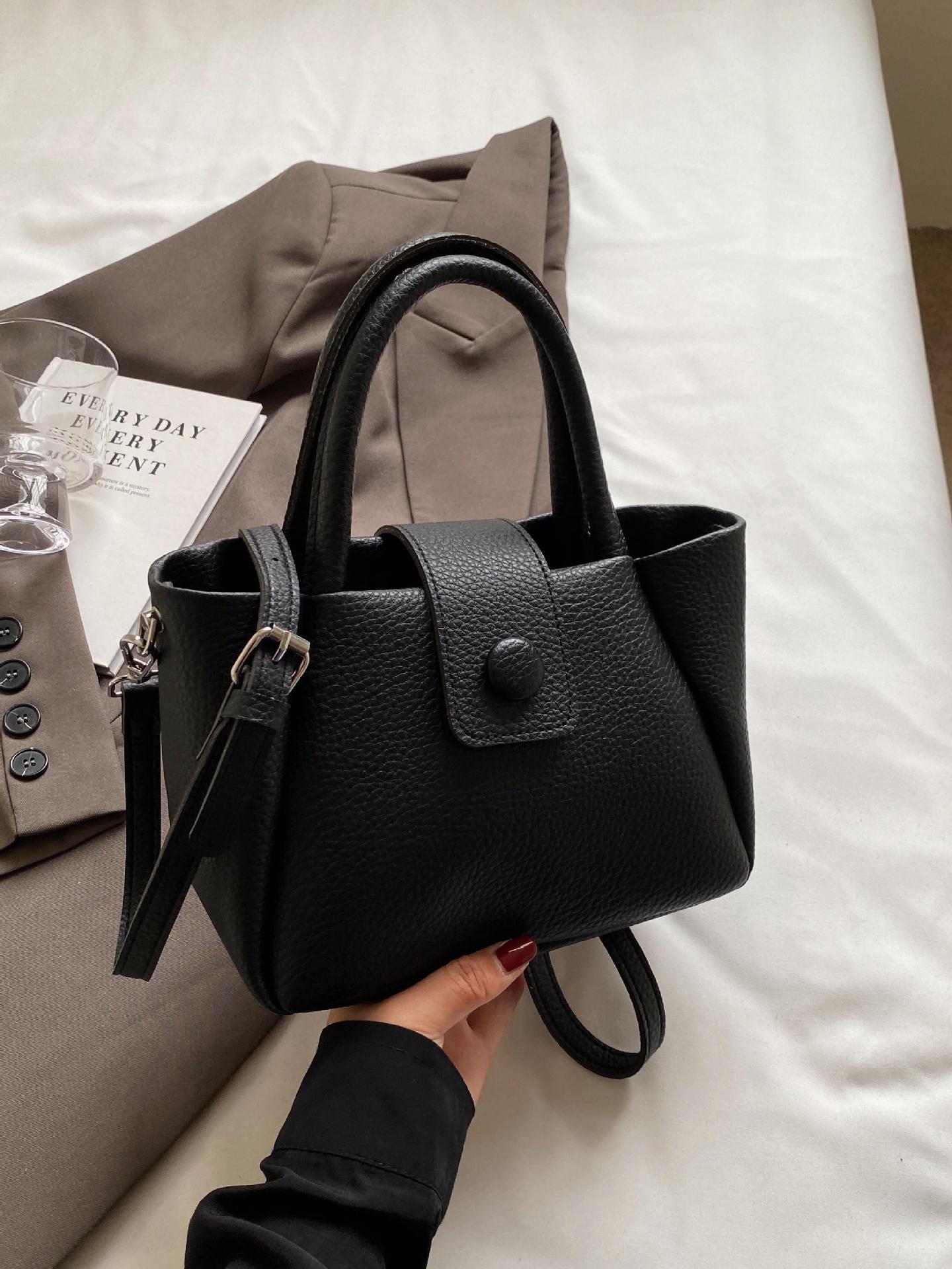 Bolso de mano de comercio exterior para mujeres 2025 nuevo tipo de bolso de mochila simple casual de moda versátil de alta calidad bolso de cubo de hombro