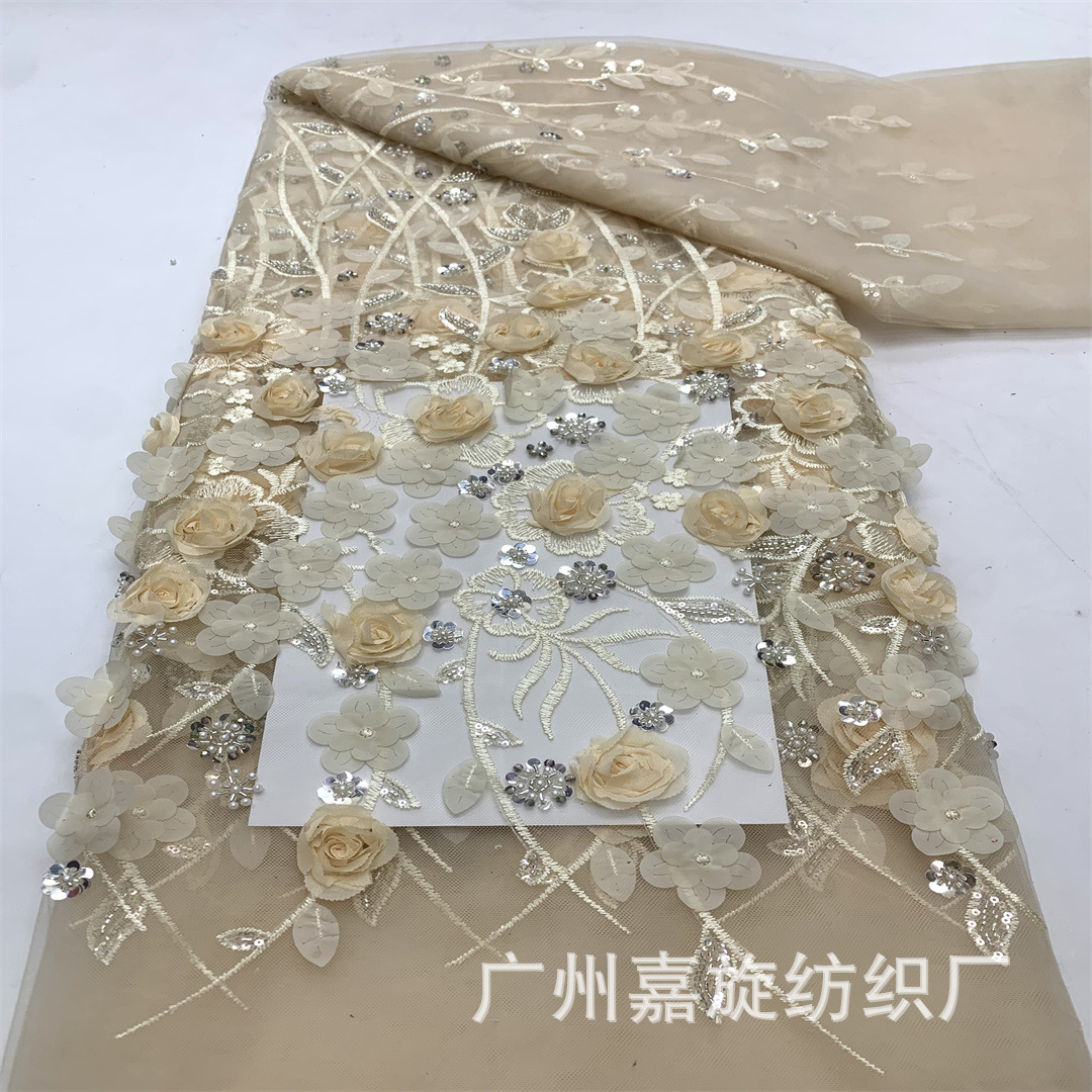 Spot aplicación unilateral hecha a mano lentejuelas bordado en tubo de cuentas hermoso vestido de novia vestido de niños tela bordada de malla