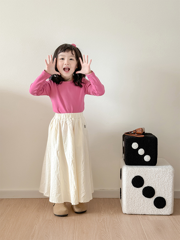 Camiseta de manga larga de algodón puro para niños 2026, camiseta básica para primavera y otoño, top cepillado de cuello redondo de color liso y corte holgado para niños y niñas.