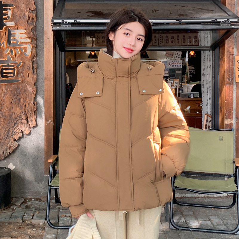 Chaqueta de algodón de pluma para mujeres 2024 invierno nuevo estilo holgado versátil coreano chic nicho suave chaqueta de algodón con capuz