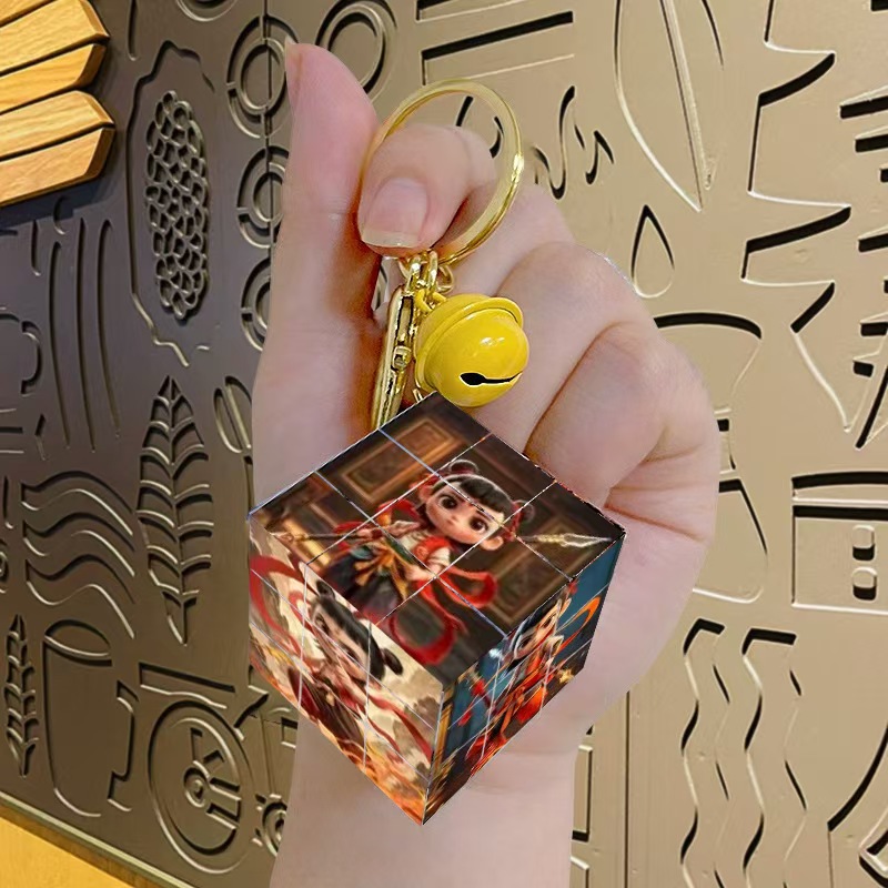 Nezha's Devil Boy Naohai Patrón de dibujos animados creativos Cubo de Rubik Llavero Bolsa Colgante Llavero Regalo pequeño al por mayor
