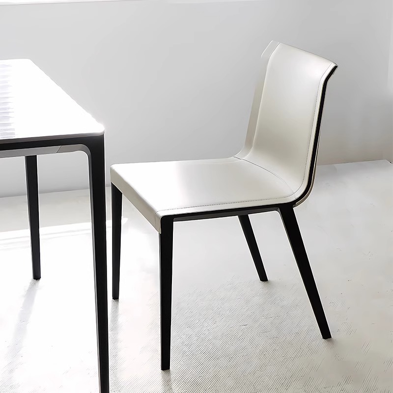 Italian Minimalist Light Luxury Designer Leather Dining Chair Modern Simple Saddle Leather Home Charlotte Dining Table and Chairs