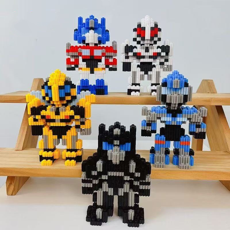 潮楽森は小さい粒子のおもちゃの星の黛露のウサギの積み木の男の子の女の子を詰めて屋台を並べて卸売りします。