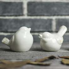 现代简约北欧极简白色陶瓷窑变釉小鸟抽象摆件家居客厅装饰品