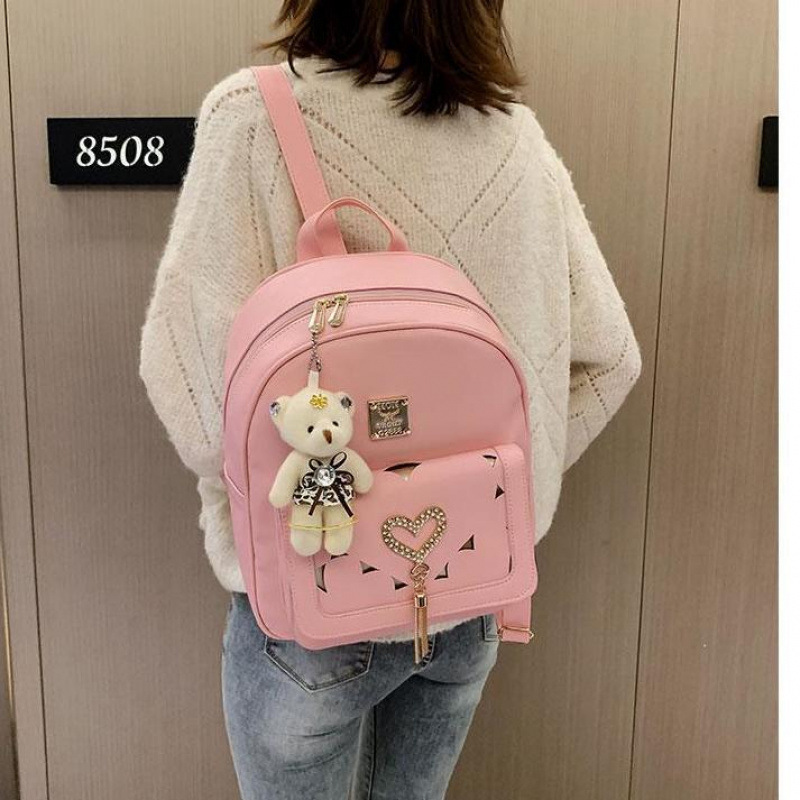 Mochila femenina versión coreana de la moda pu2023 nueva pequeña y fresca borla hueca salvaje casual estudiante mochila escolar mochila