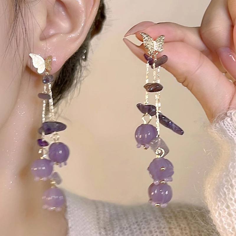 Diseño de nicho de alta gama borla larga sin orejas clip de oreja elegante estilo occidental de las mujeres cara-mirando pequeños nuevos pendientes de moda