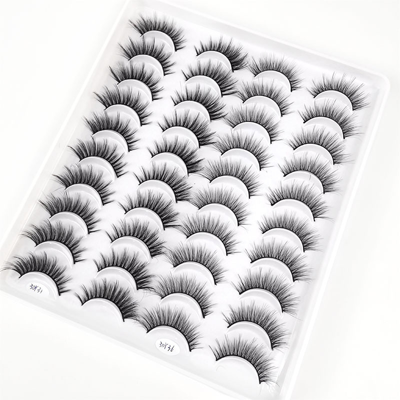 Fábrica al por mayor una caja de 20 pares de pestañas postizas 3D pestañas cortas naturales de varios niveles suministro transfronterizo europeo y americano