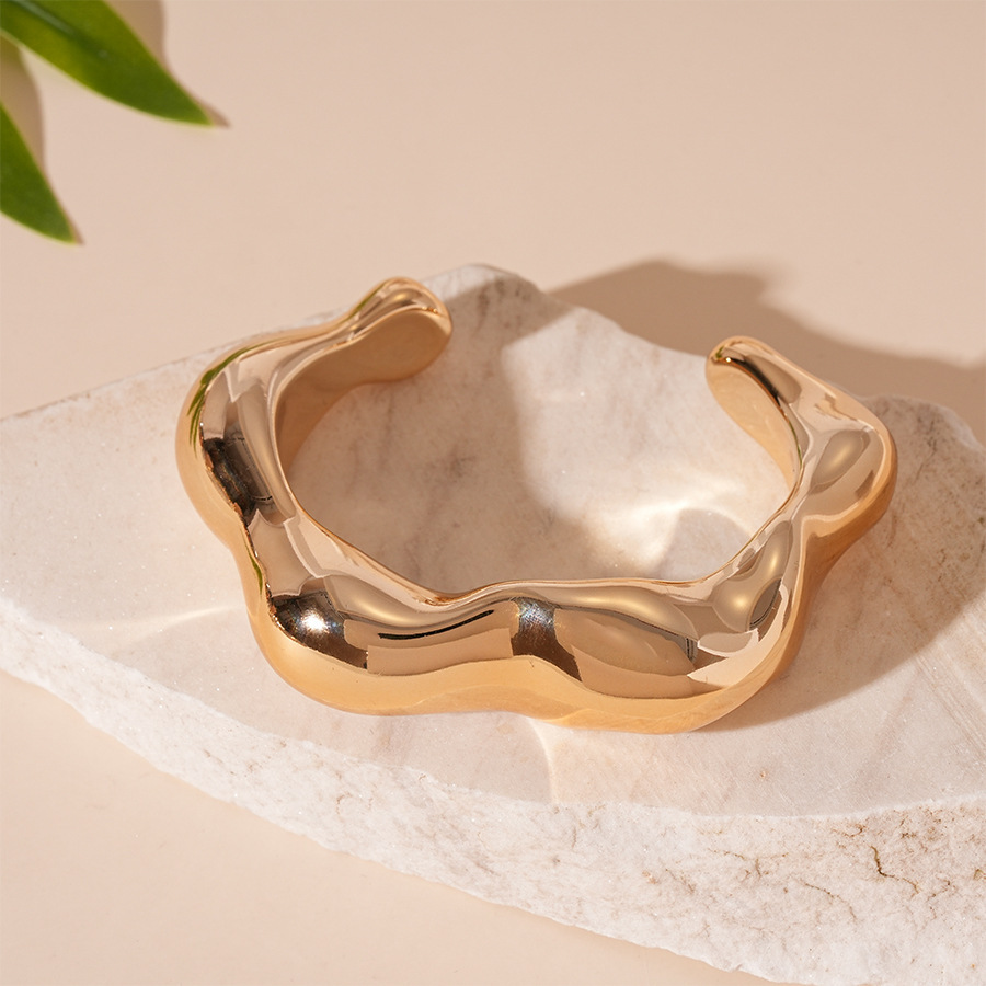 Pulsera de apertura geométrica irregular metálica europea y americana, personalidad exagerada, temperamento de nicho simple, joyería de alta gama femenina