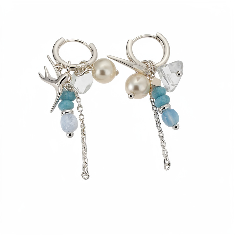 Accesorios de vacaciones golondrina perlas perlas auriculares temperamento nicho de moda aretes ligeros de lujo alta sensación auriculares al por mayor