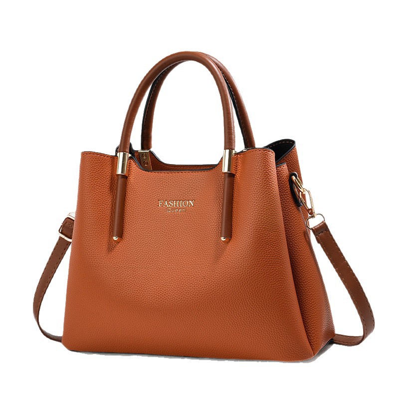 Bolso de mano con textura de color sólido 2025 nuevo bolso de hombro de diseño simple bolso de mensajero de viaje casual bags transfronterizos