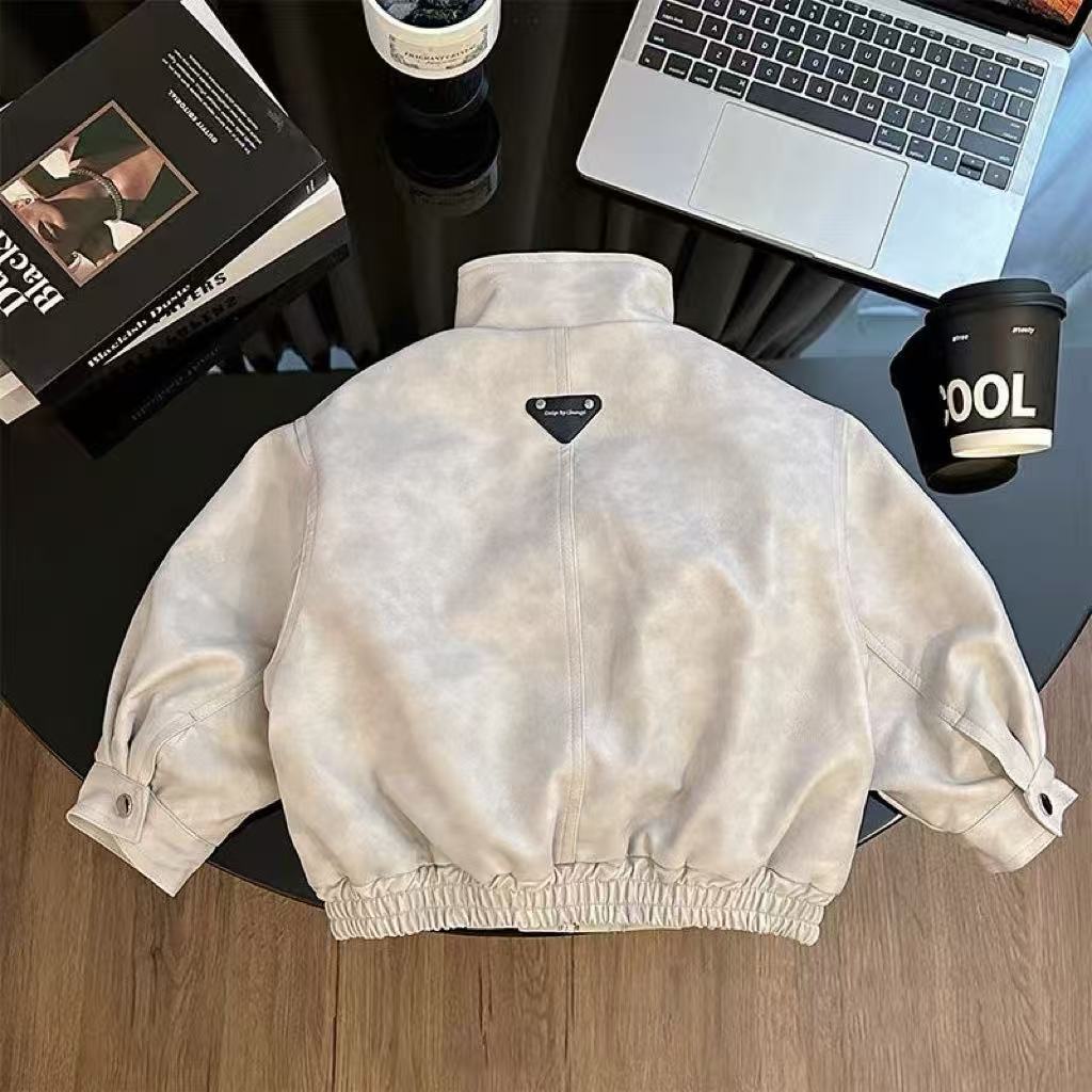 Niños chaqueta PU abrigo de invierno 2025 nuevo guapo niño con chaqueta de locomotiva de lana para niños chaqueta cálida