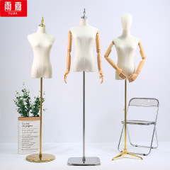 衣料品店のモデルの道具の女性の半全身の婦人服のショーウインドーの人の台の服の展示棚のウェディングドレスのマネキンの棚
