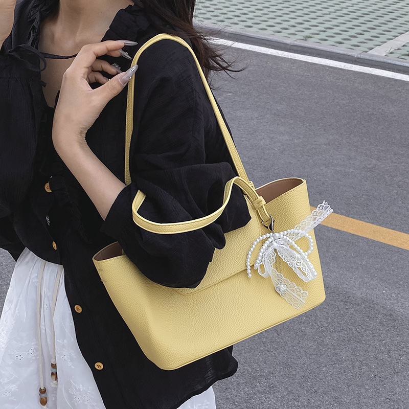 Bolso Tote de cercanías todo-fósforo de nicho retro transfronterizo para mujer 2025 primavera nuevo estilo estilo occidental bolso de axila de un solo hombro de gran capacidad