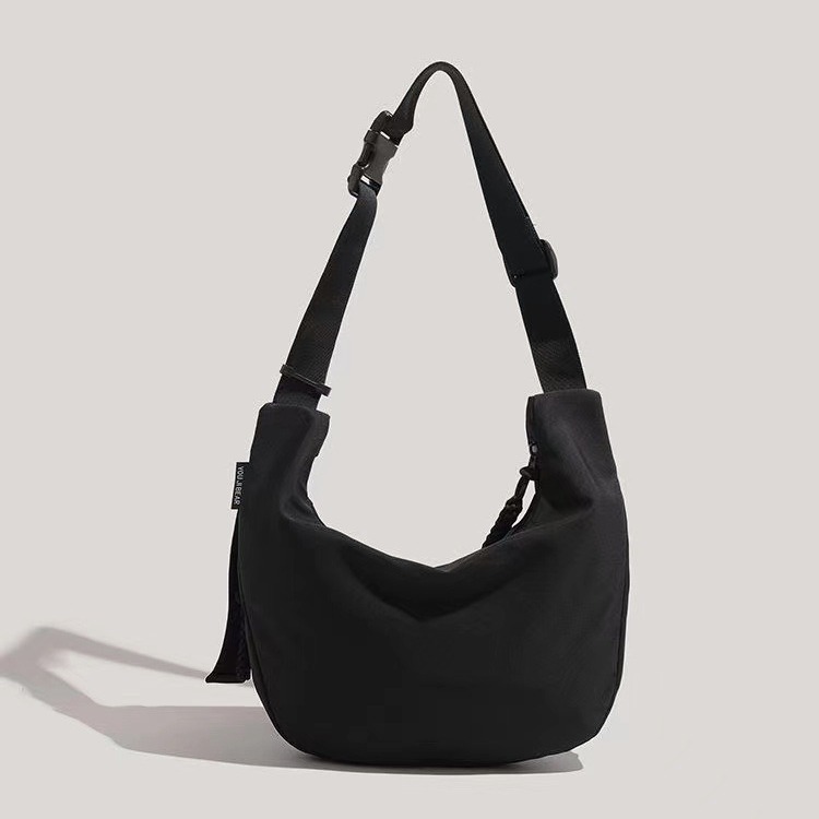 Dumpling Bun Female 2024 New Campus Sports Style Versatile Commuting Large Capacity Tote Classroom Single Shoulder_voghion.com