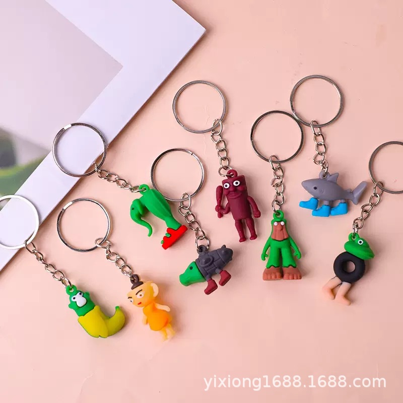 Colgante de hombre de palo de madera transfronterizo Douyin Hot Terrier versión extranjera de Shanhaijing llavero divertido mano abstracta caja ciega accesorios