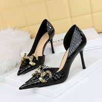 8238-1 European and American banquet high heels, thin heels, high heels, shallow mouth, pointed side hollowed out metal rhinestone buckle single shoes, women's shoes