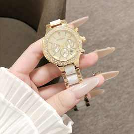 女士时尚多眼镶钻腕表闪耀钻圈环绕金白配色陶瓷表带米黄表盘精致
