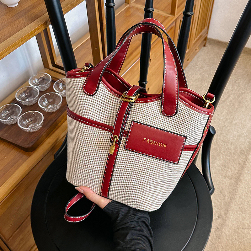 Nicho de diseño retrógrado lienzo portátil bolso de cubo de agua mujer 2026 nuevo cross-border ins canasta de moda bolso de mochila image 4