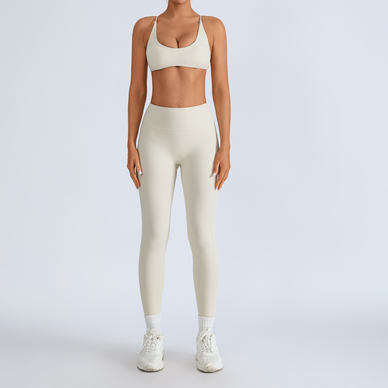 Traje de yoga europeo y americano transfronterizo, espalda hermosa con almohadilla para el pecho, sujetador con tirantes cruzados, pantalones deportivos de secado rápido de melocotón de cintura alta