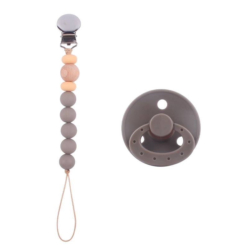 Nuevo bebé suministros chupete DIY creativo bebé silicona mordedura molar pezón cadena traje de dos piezas