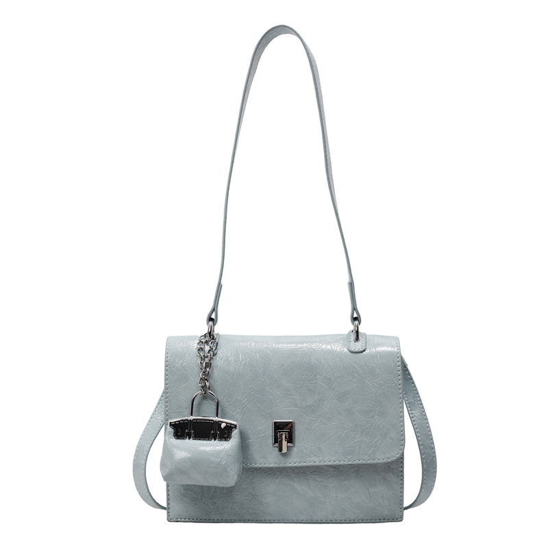 Bolso de textura transfronteriza 2025 primavera y verano nuevo bolso femenino bolso de hombro con patrón de agarre de mano de alta gama bolso de mensajero simple y versátil