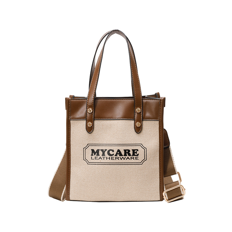 Bolso de mochila para mujeres 2025 nuevos productos transfronterizos de color de mano vertical tote de alta calidad bolsa de compras de transporte